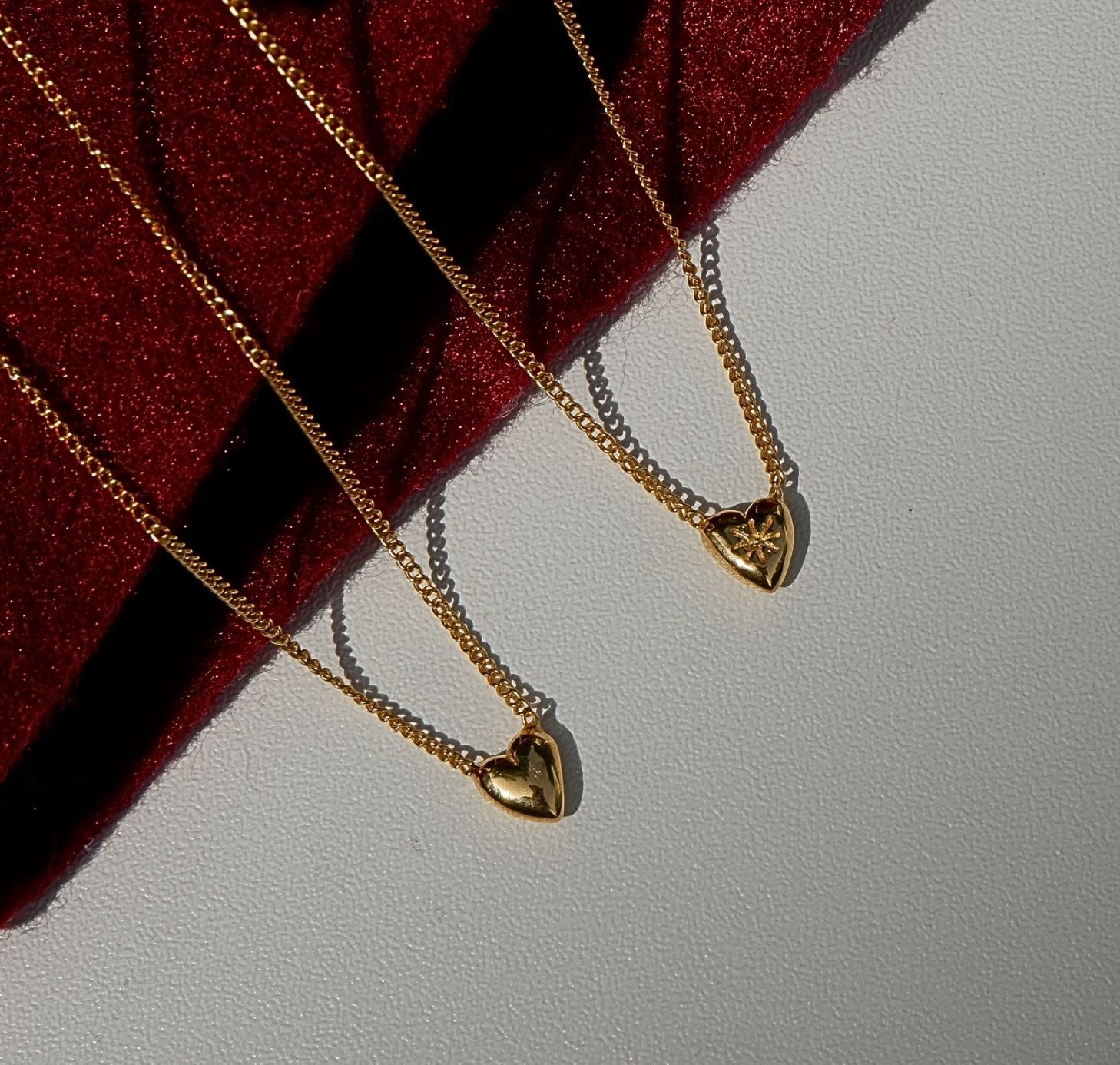 Two Mini Heart Gold Necklaces made from Recycled Sterling Silver. Love Burst heart