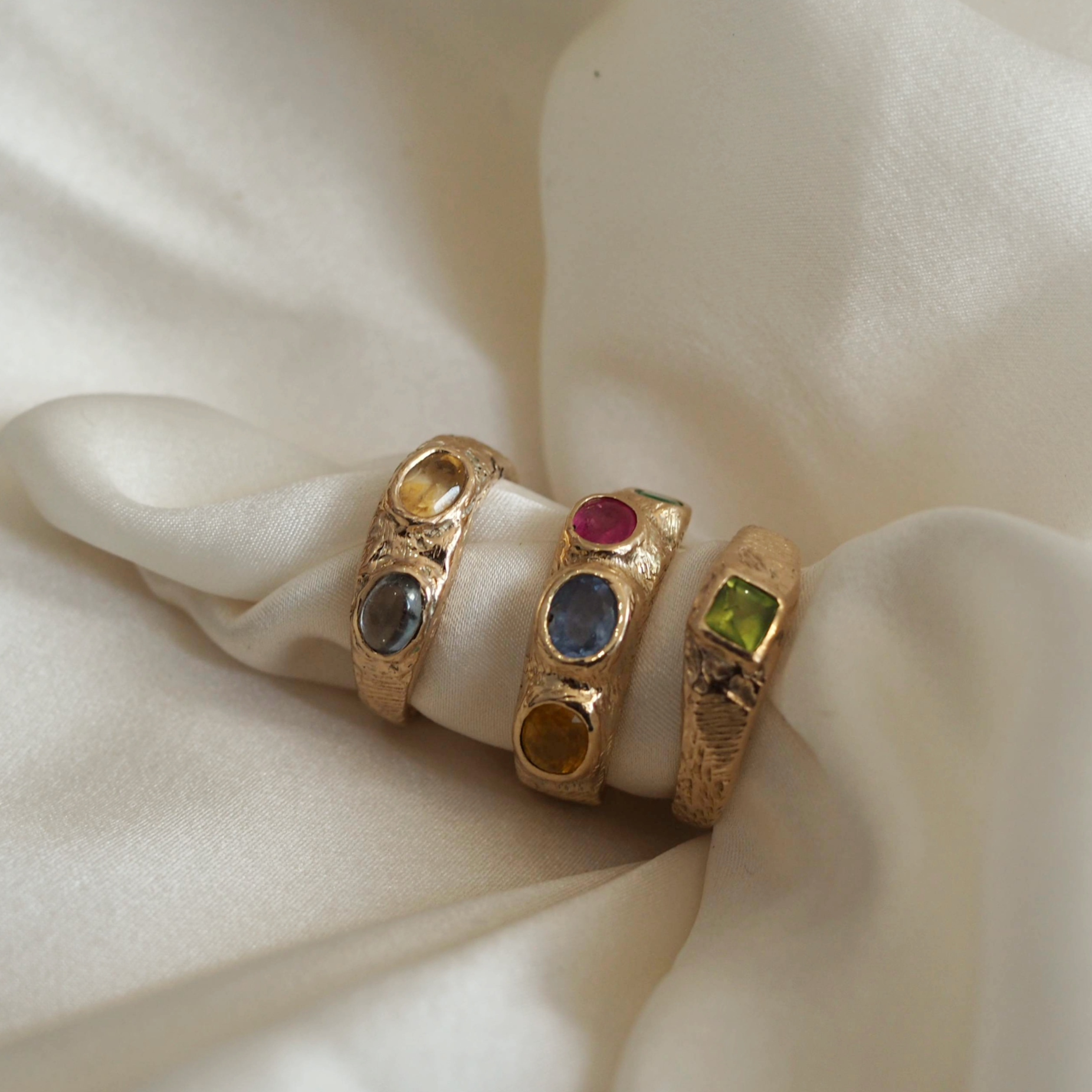 Solid gold Rosie ring with customizable stones, handcrafted for a unique look.