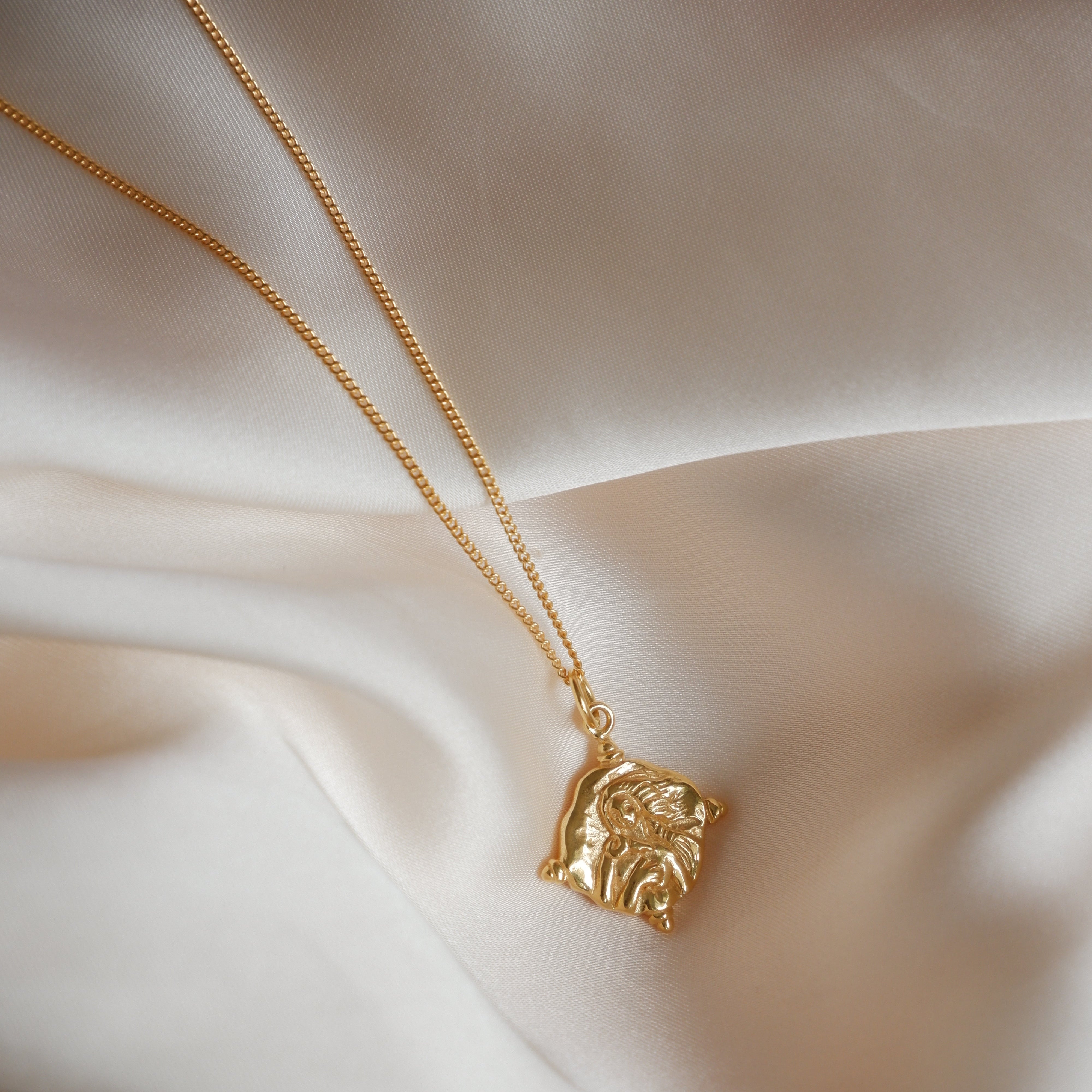 Aphrodite charm gold