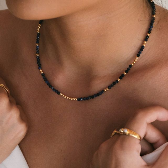 Beaded necklace with blue gemstones