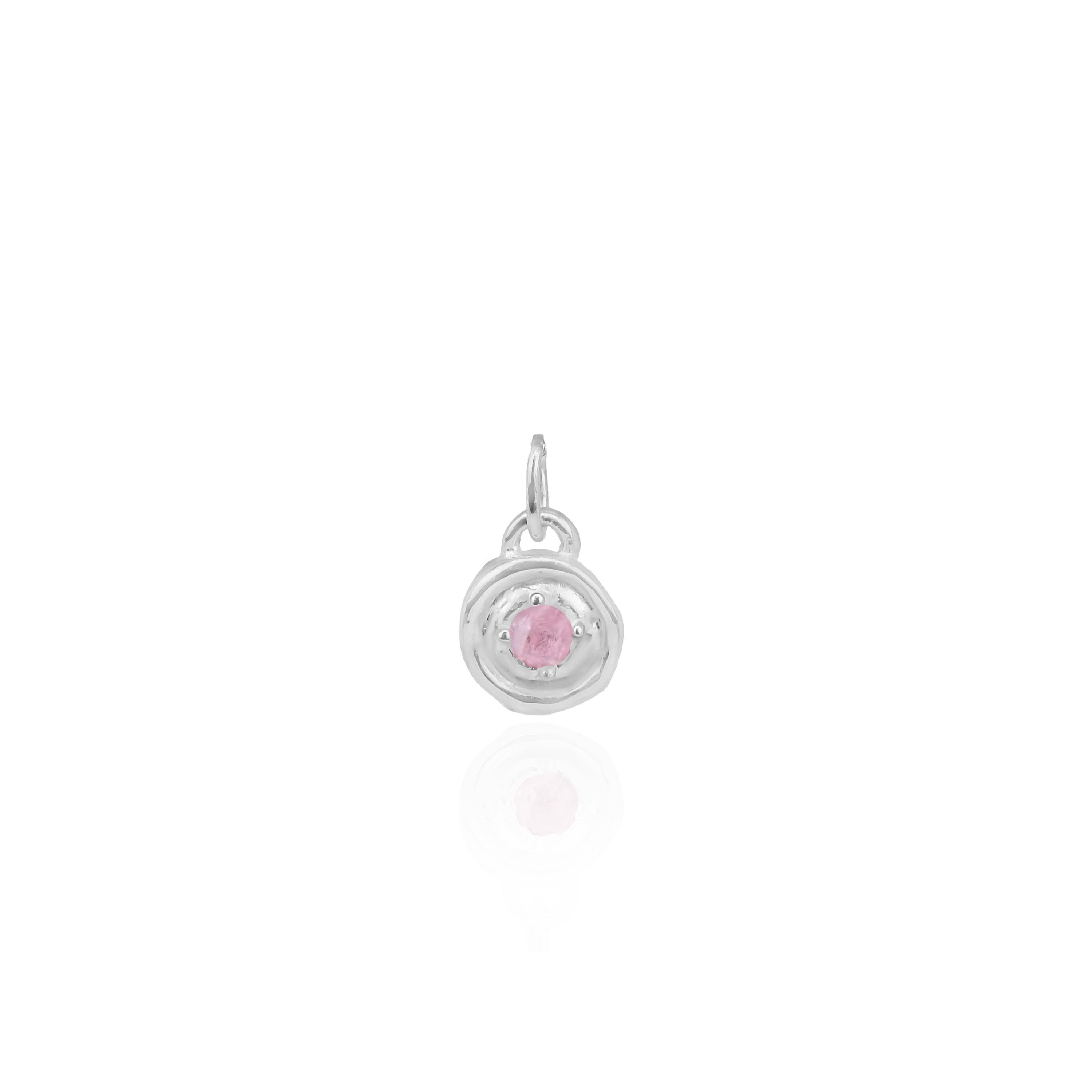 Silver pendant with a pink gemstone on a white background