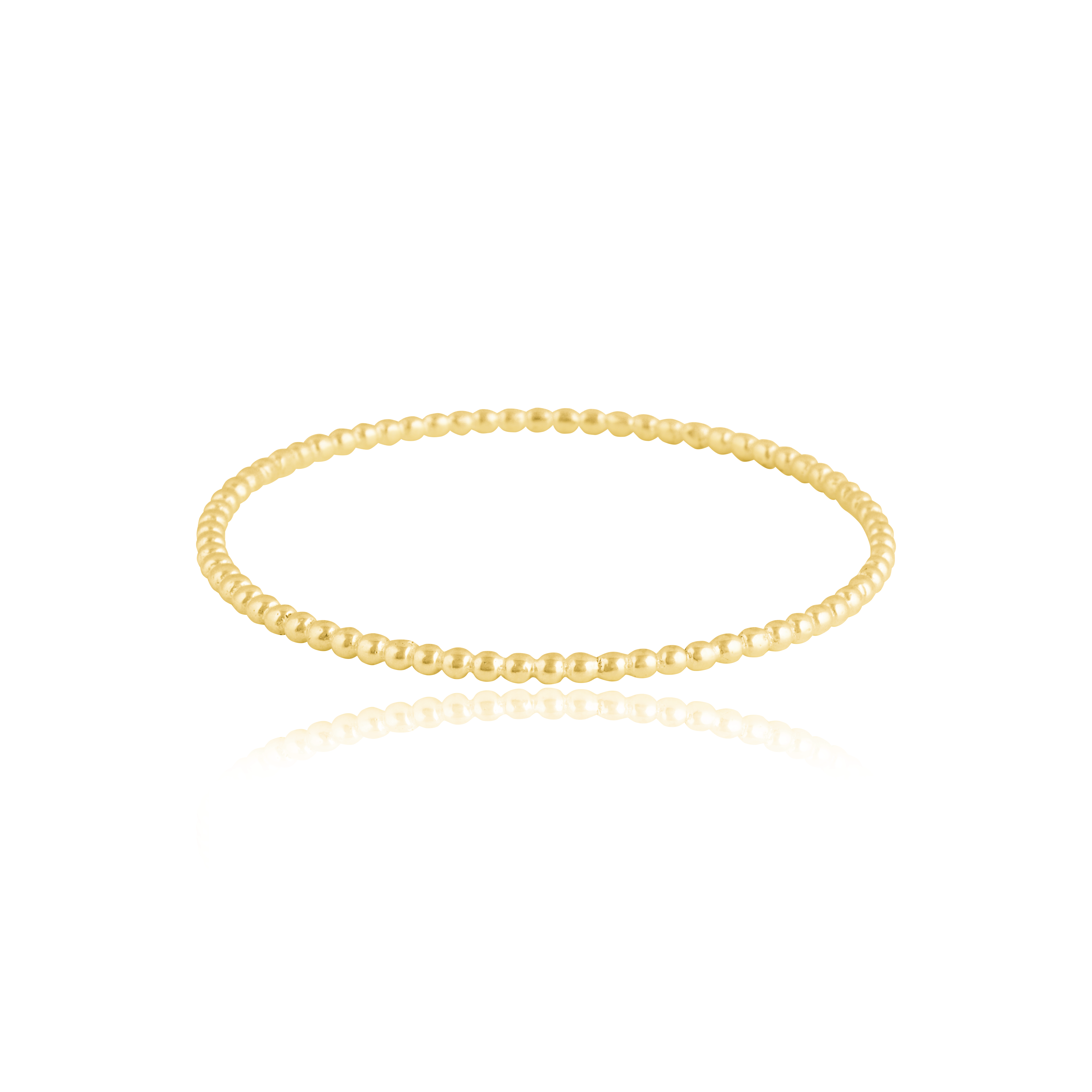 A thin gold beaded bracelet displayed against a white background.