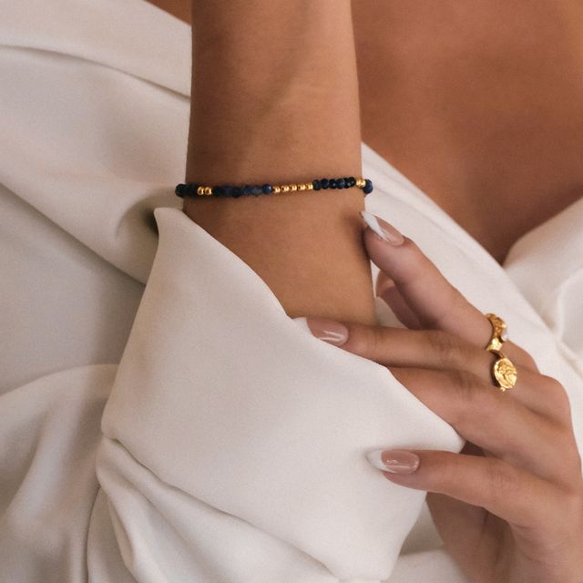 Bracelet with blue beads and gold details