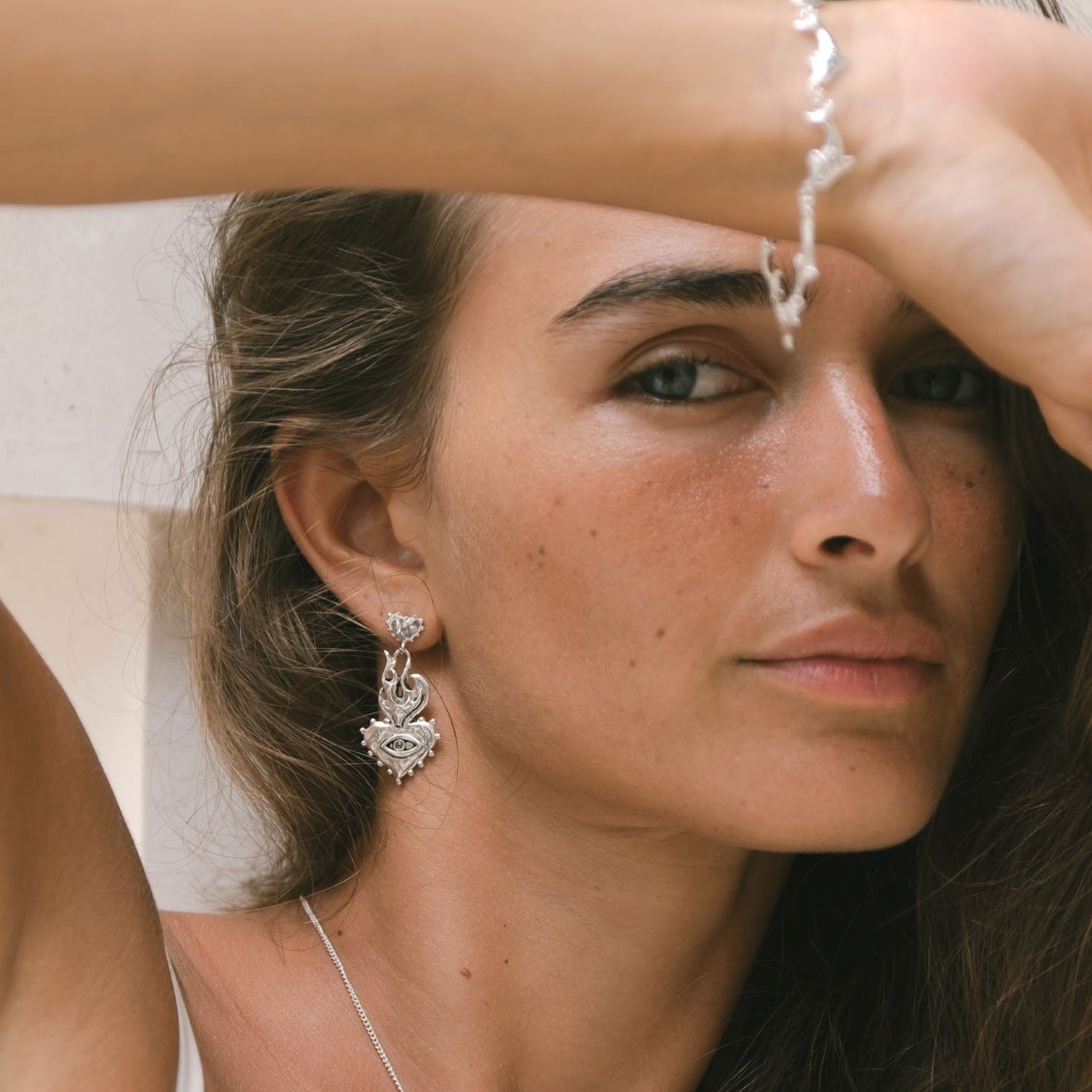 Luna & Rose x Tahnee Kelland ‘Burn It All Down’ silver flaming heart statement earrings, ethically made in Bali from recycled sterling silver model.