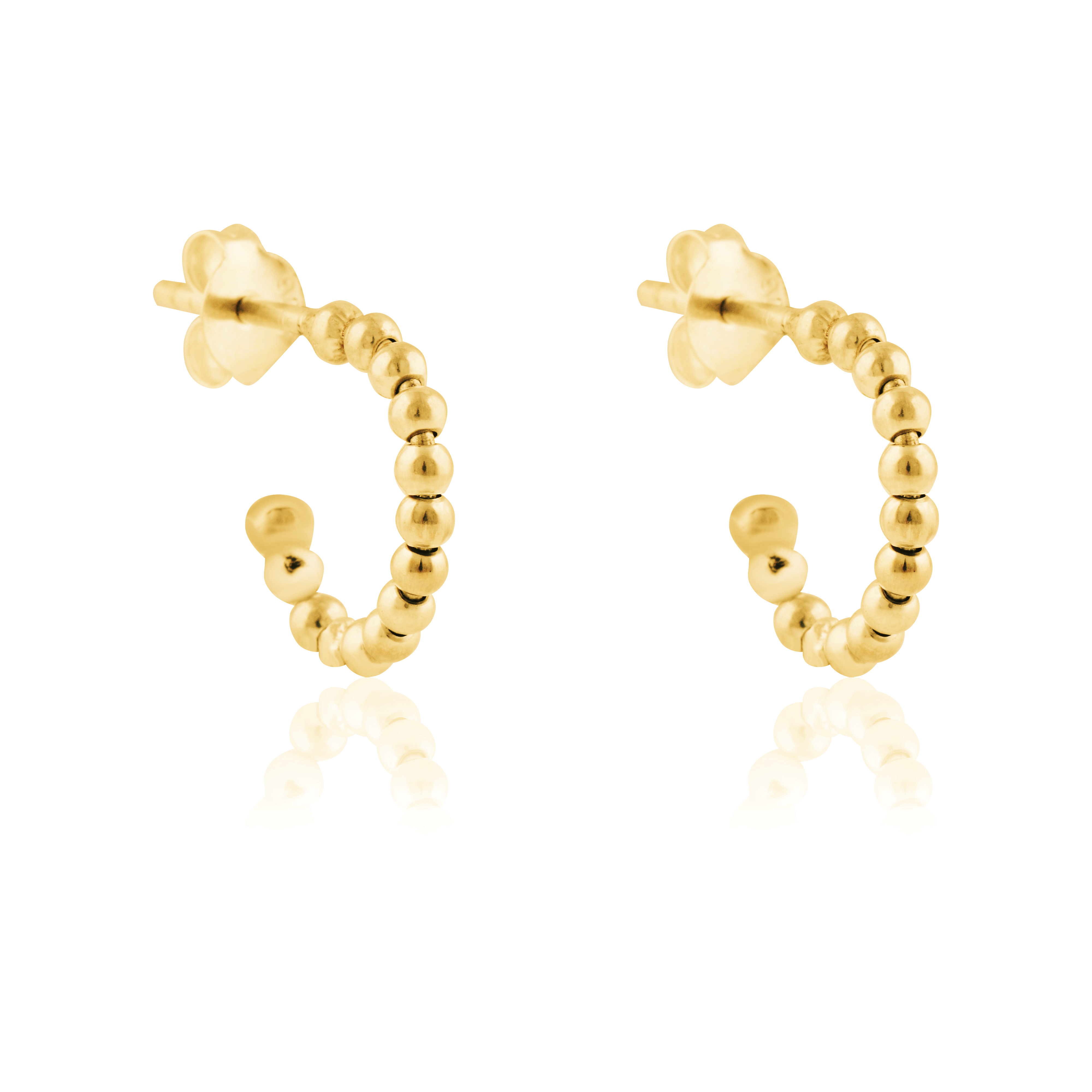 Thin gold beaded earrings angled slightly, shown against a white background.