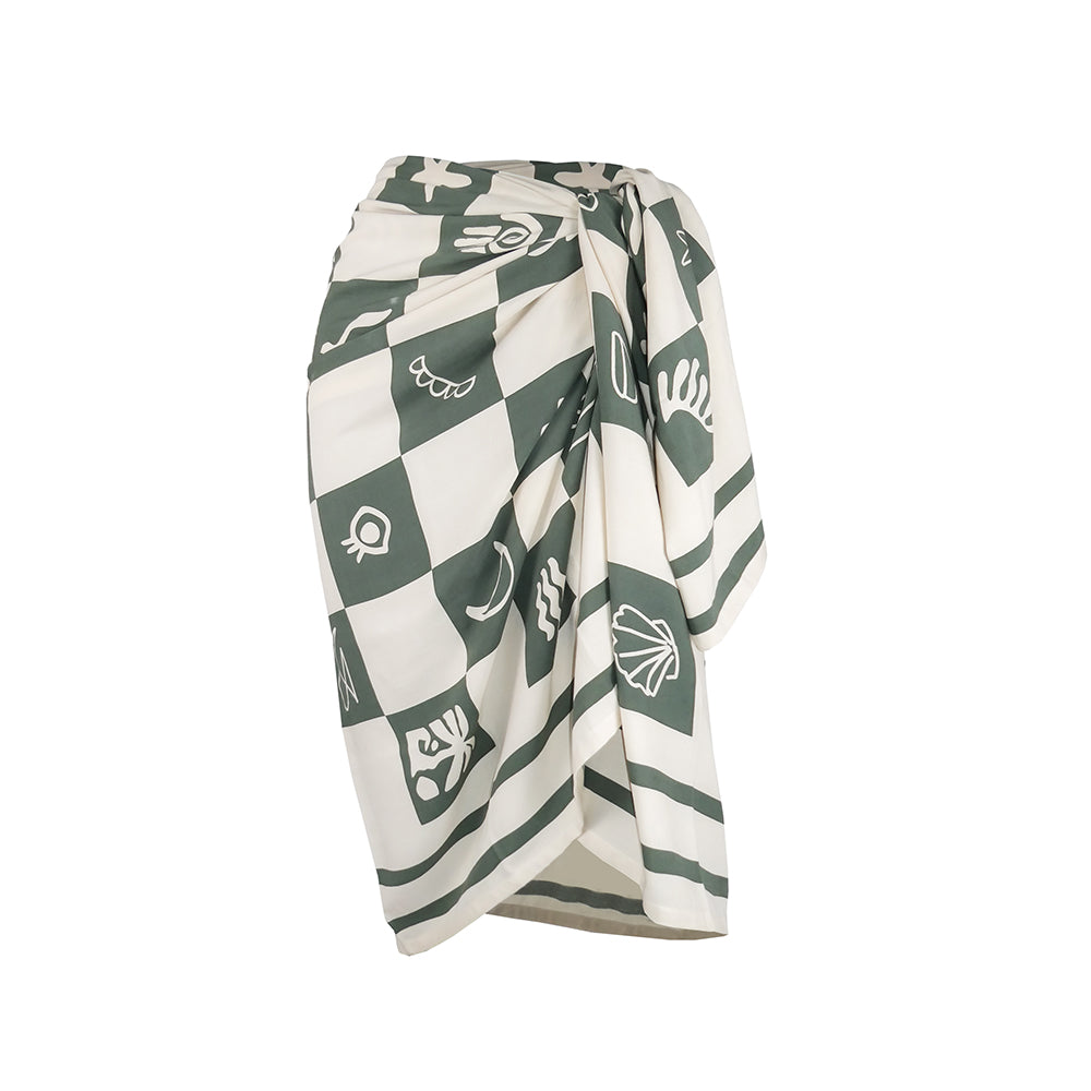 Eucalyptus-colored sarong for a tropical holiday look on white