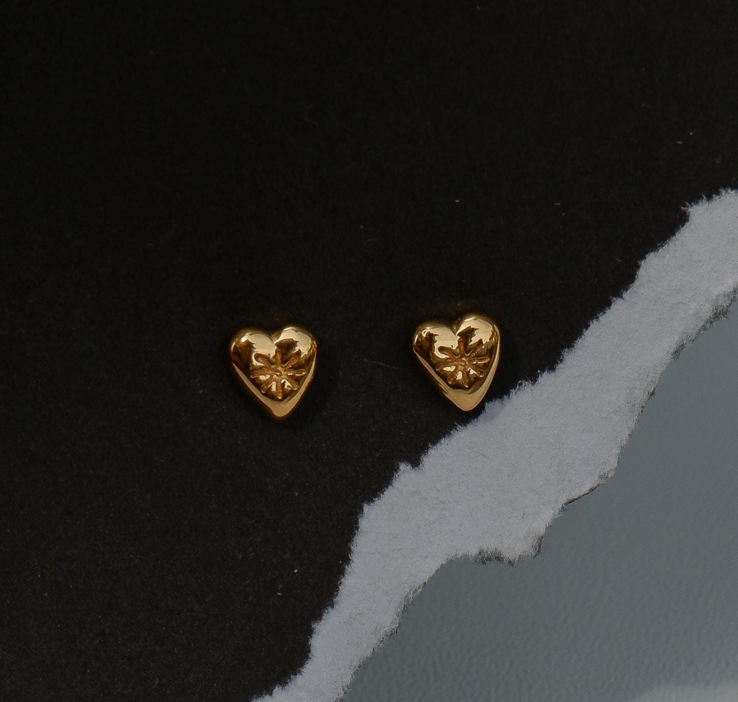 two gold heart stud earrings from luna & rose