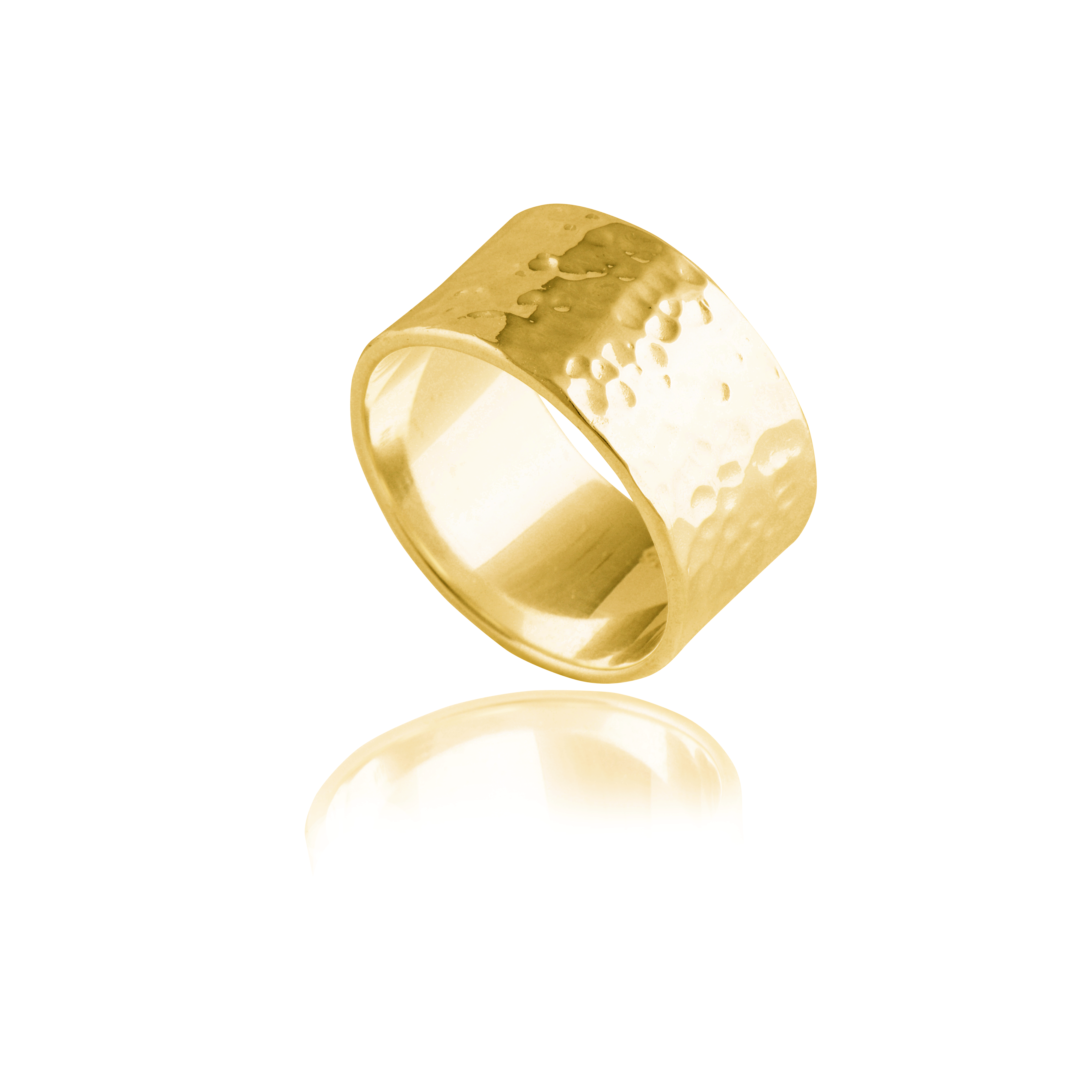 A gold hammered ring isolated on a white background with a reflection.