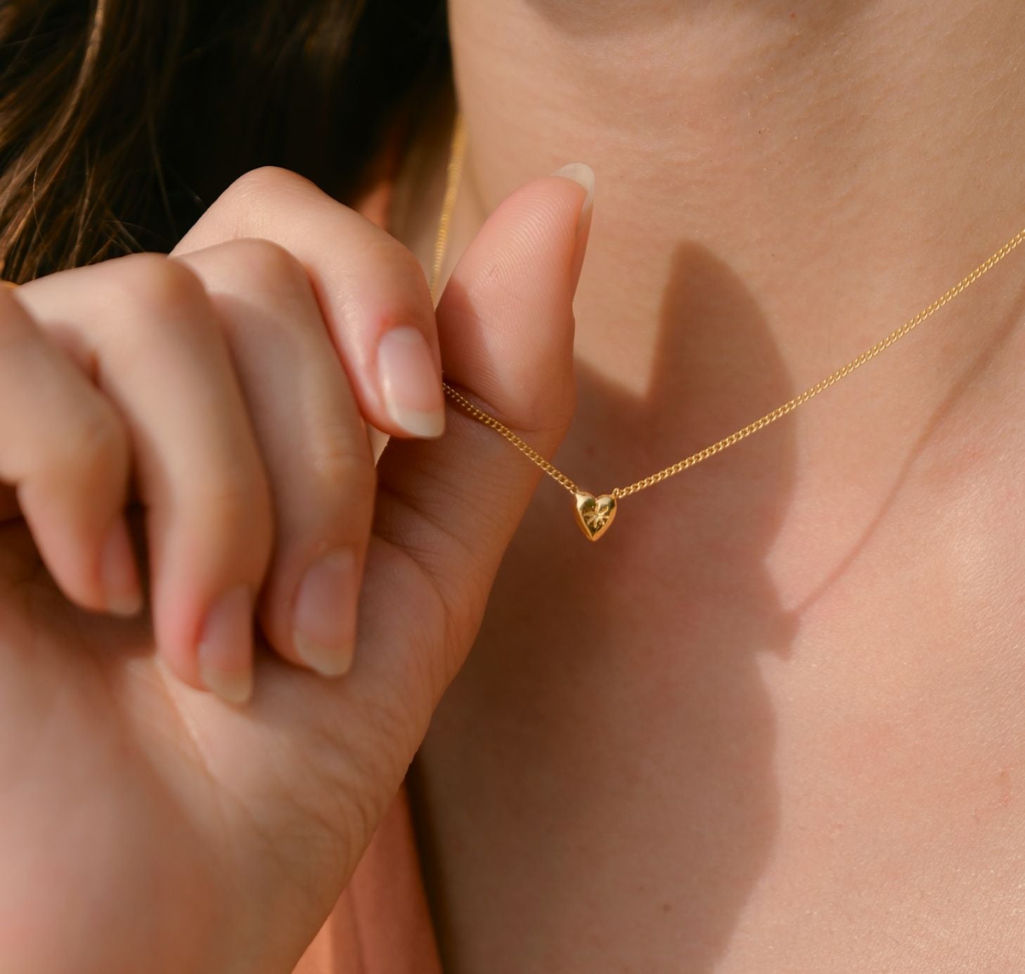 Luna and Rose Gold heart necklace on model