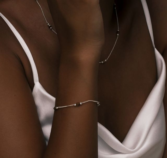 a woman wearing The Sunstone Bracelet Silver by Luna and Rose Bali