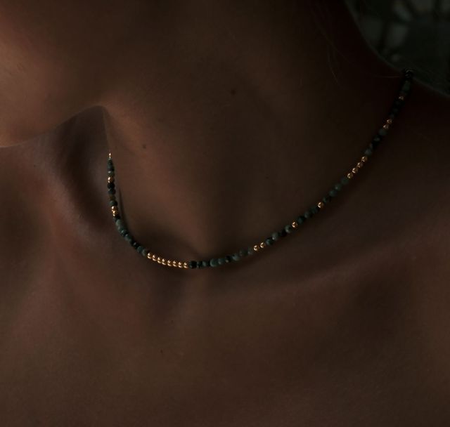 a woman wearing The Valley Necklace Gold by Luna and Rose Bali