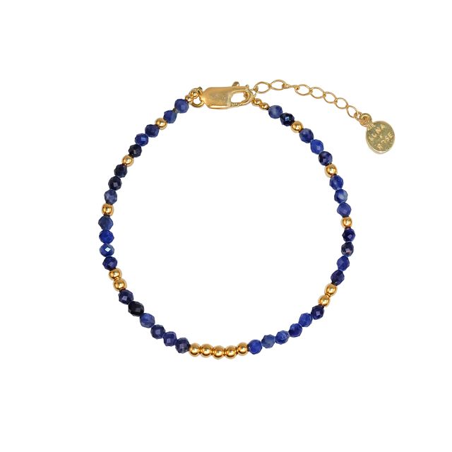 The Indigo Tide Bracelet gold in white background