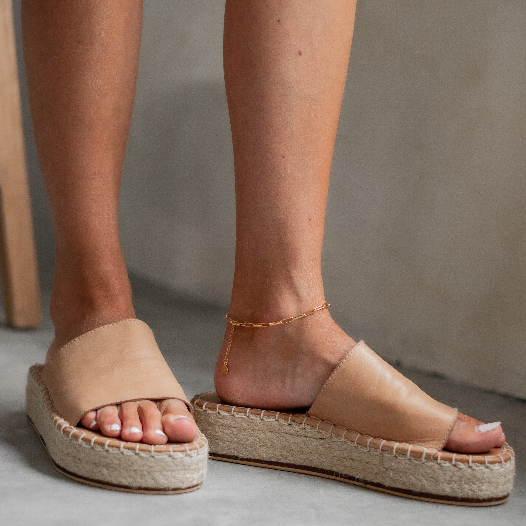 Washington Paper Clip Anklet - Gold on a woman with leather sandals