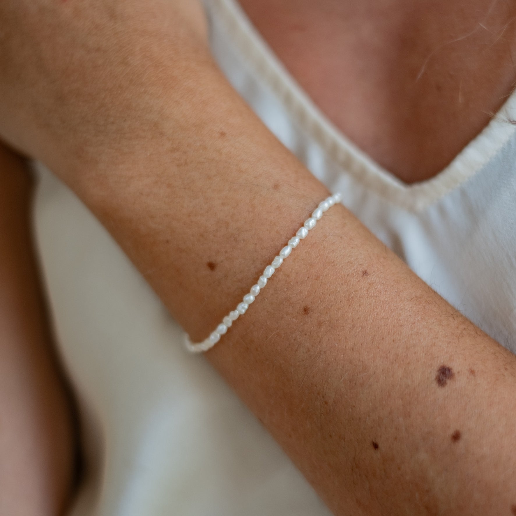 Timeless Mini Pearl Bracelet - Silver on a woman wrist
