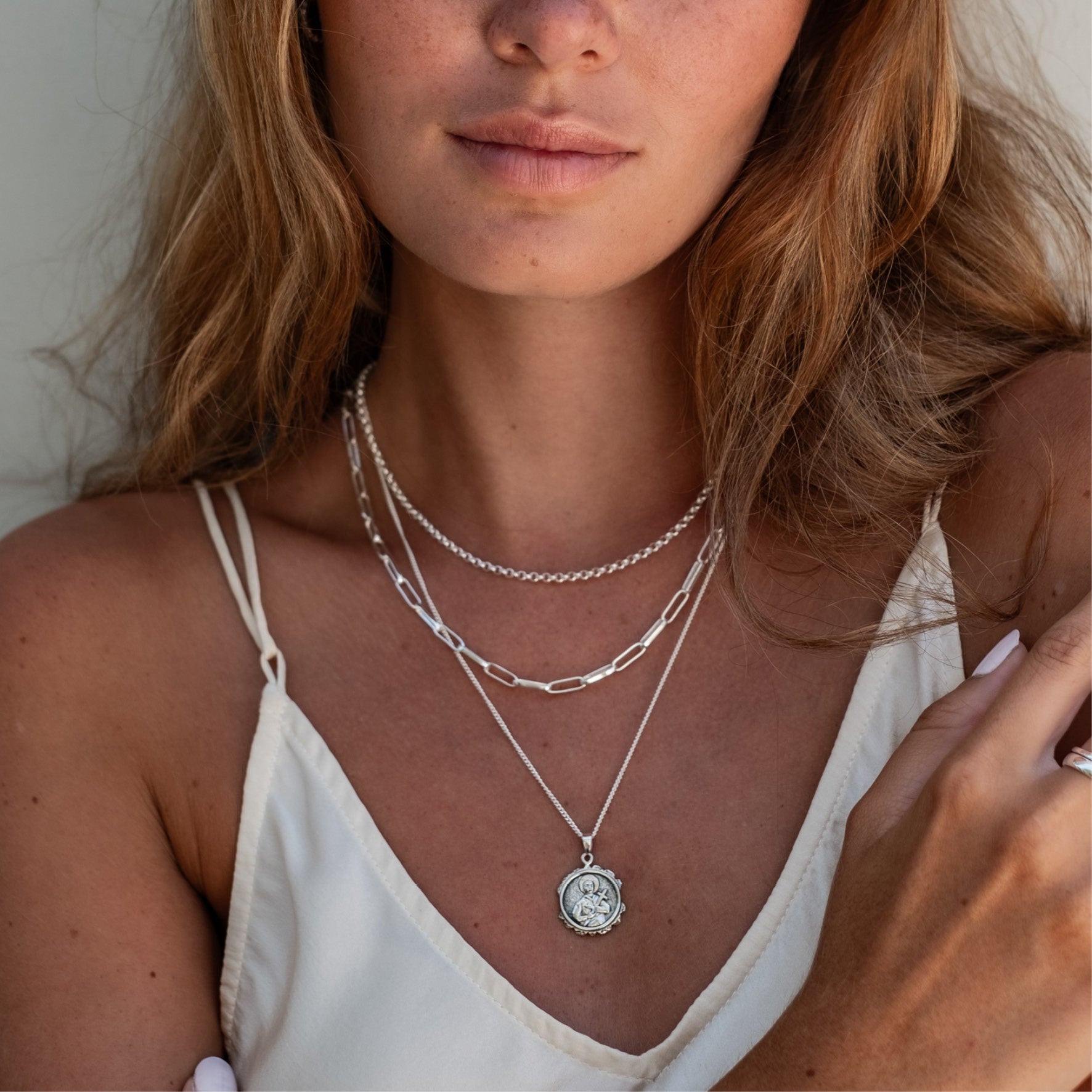 a woman worn Washington Paper Clip Chain Necklace - Silver and others two styles necklaces silver