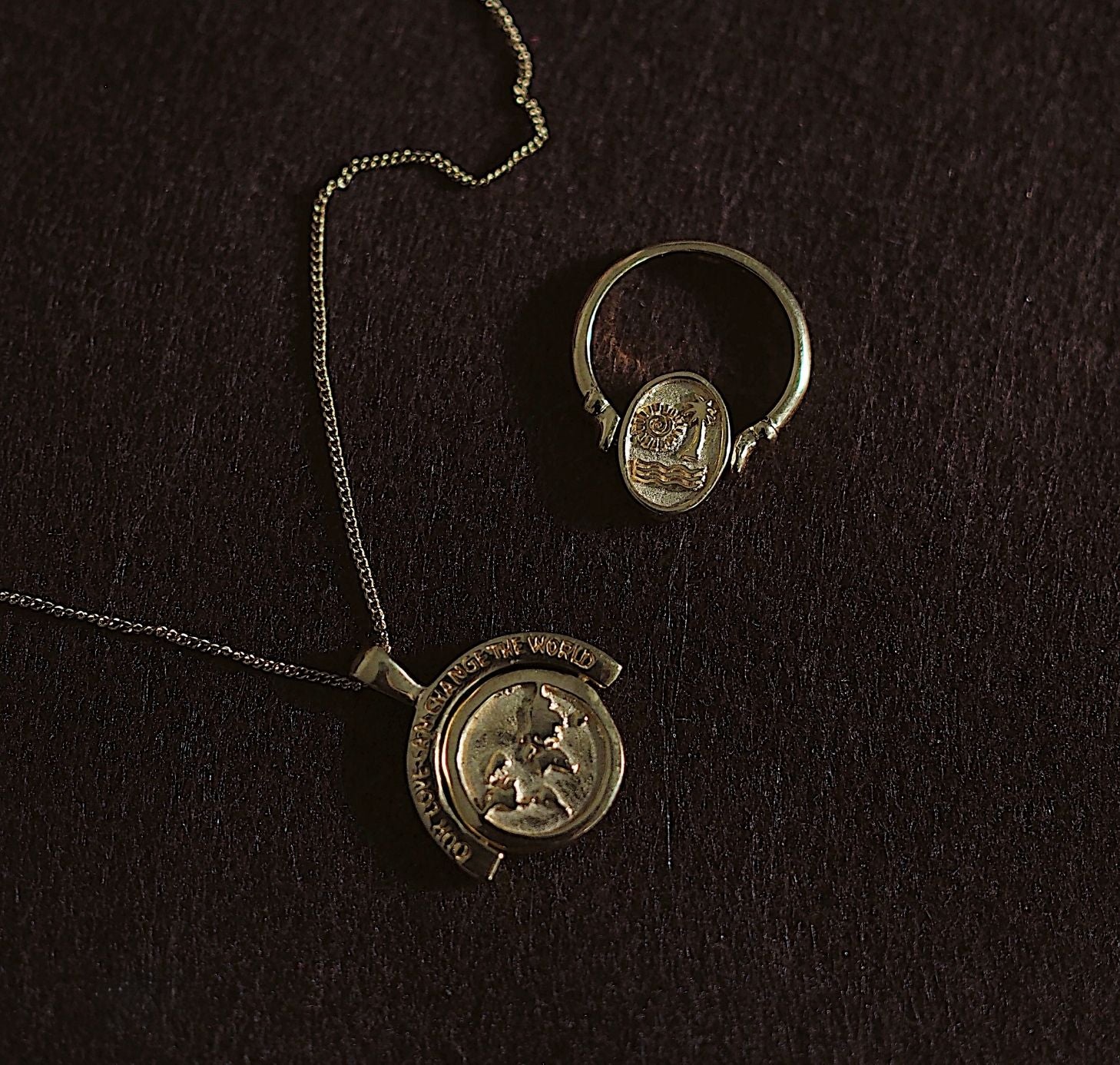 abundance in pendant and ring gold