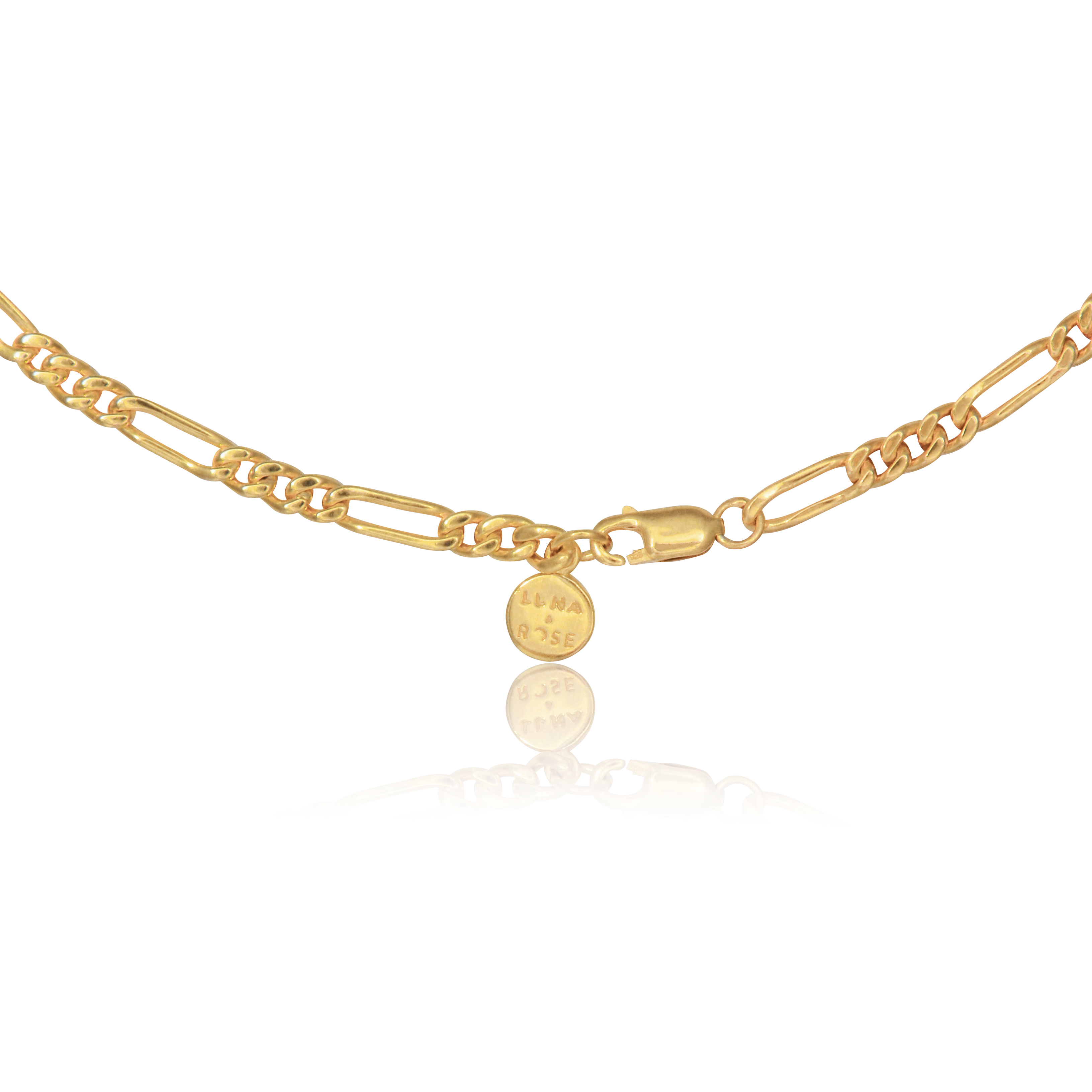 The closure of a gold chain necklace with a clasp, displayed on a reflective white background.
