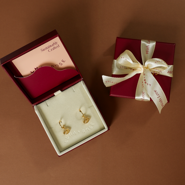 evil eye earrings gold in packaging luna and rose