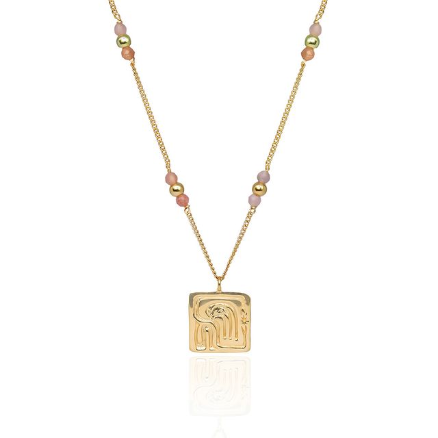 Product shot of a Held gold necklace on a plain white background