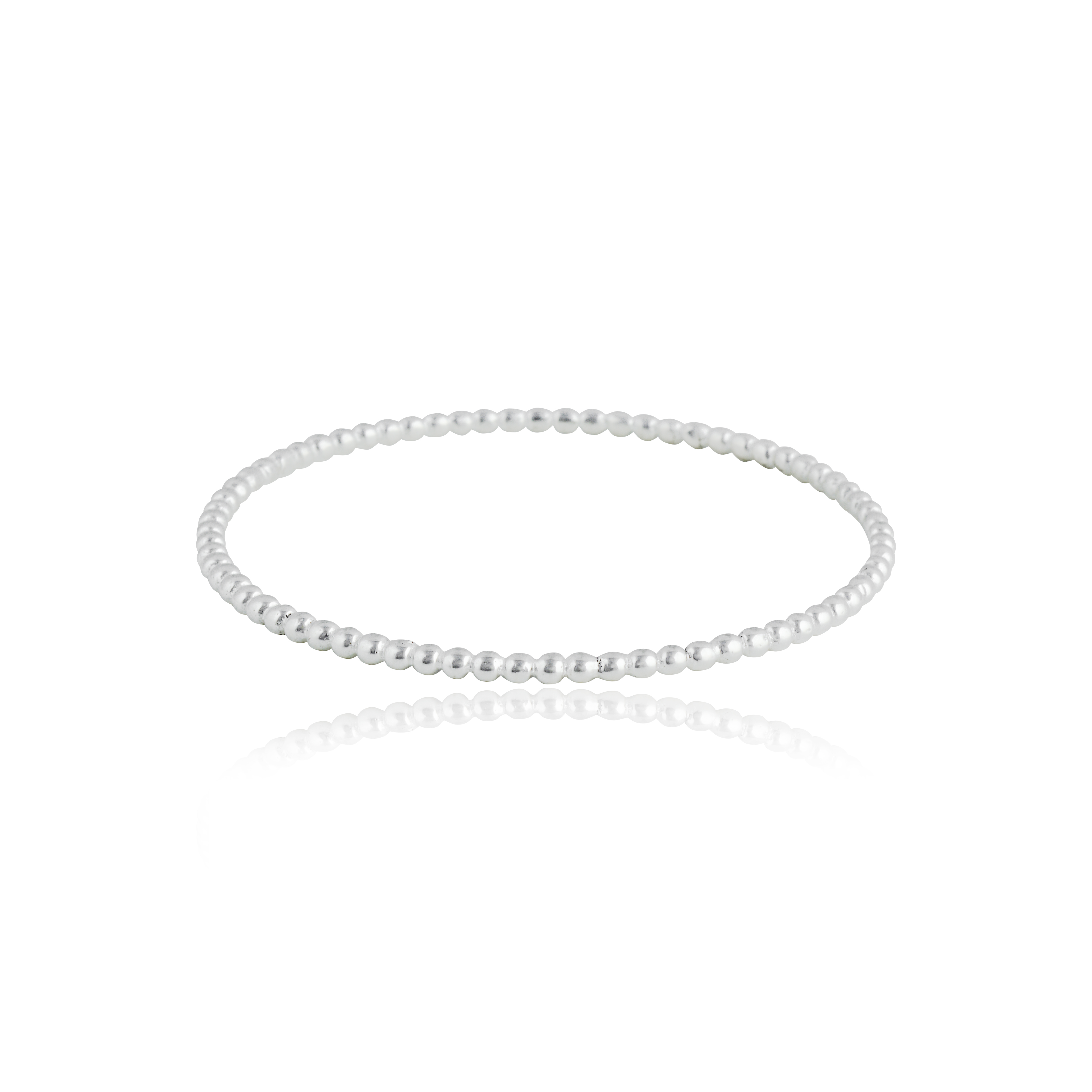 A thin silver beaded bracelet displayed against a white background.
