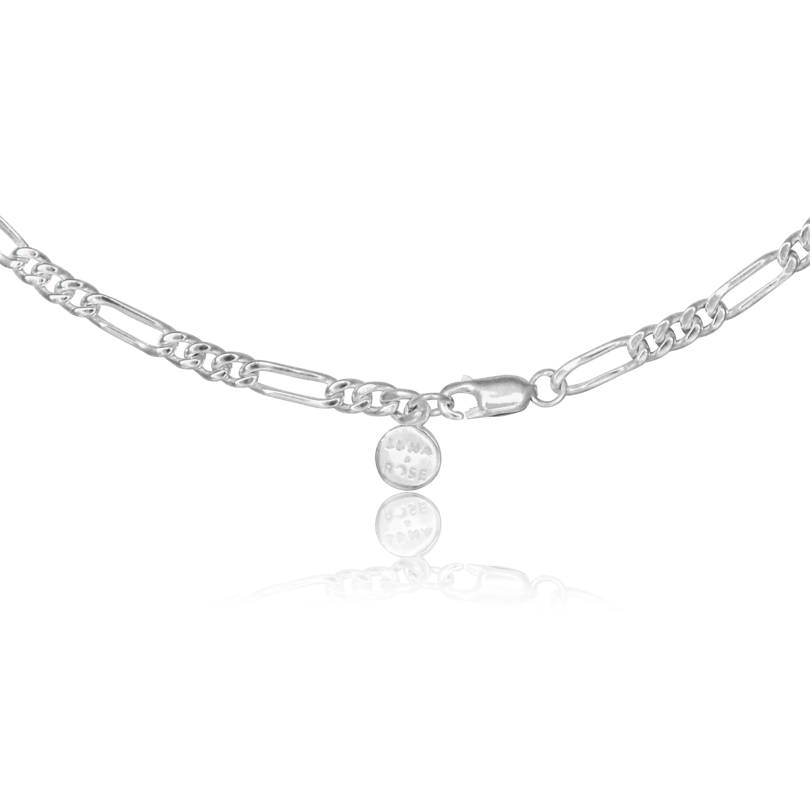 The closure of a silver chain necklace with a clasp, displayed on a reflective white background.