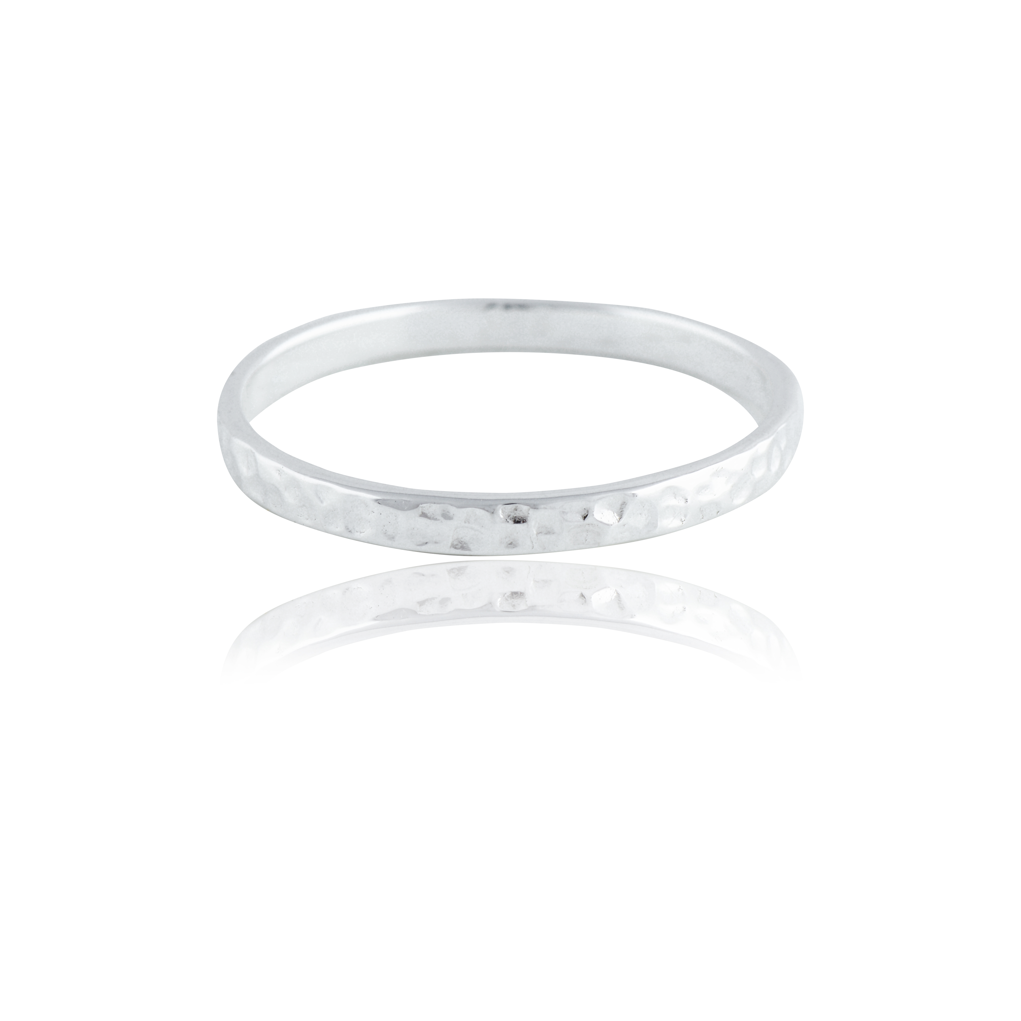 A single narrow, silver hammered ring isolated on a white background with a reflection.