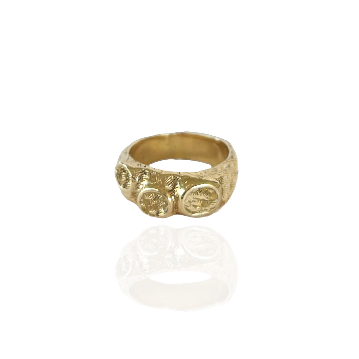 Solid gold Rosie ring with three customizable stones, handcrafted for a unique look.
