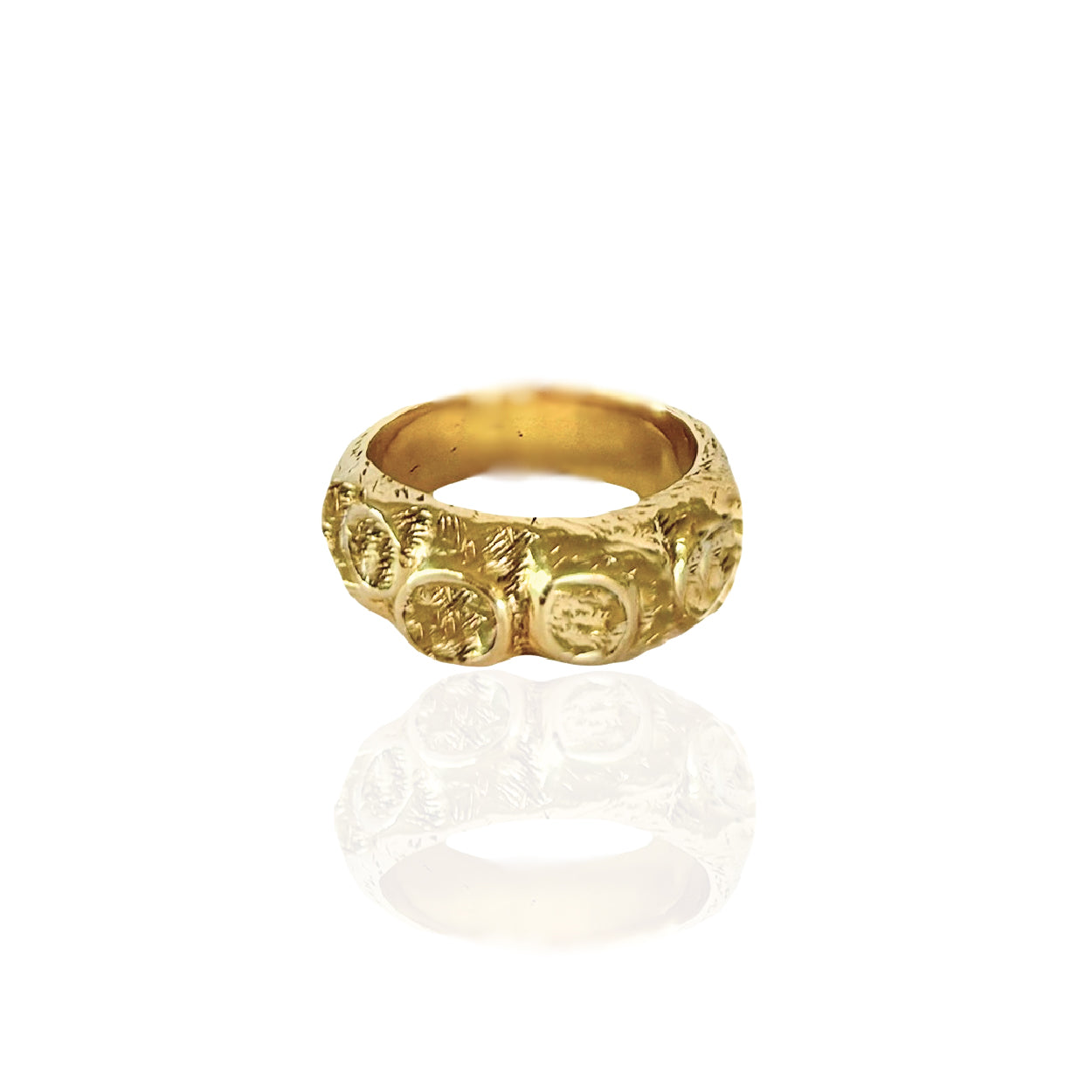 Solid gold Rosie ring with four customizable stones, a symbol of elegance and craftsmanship.