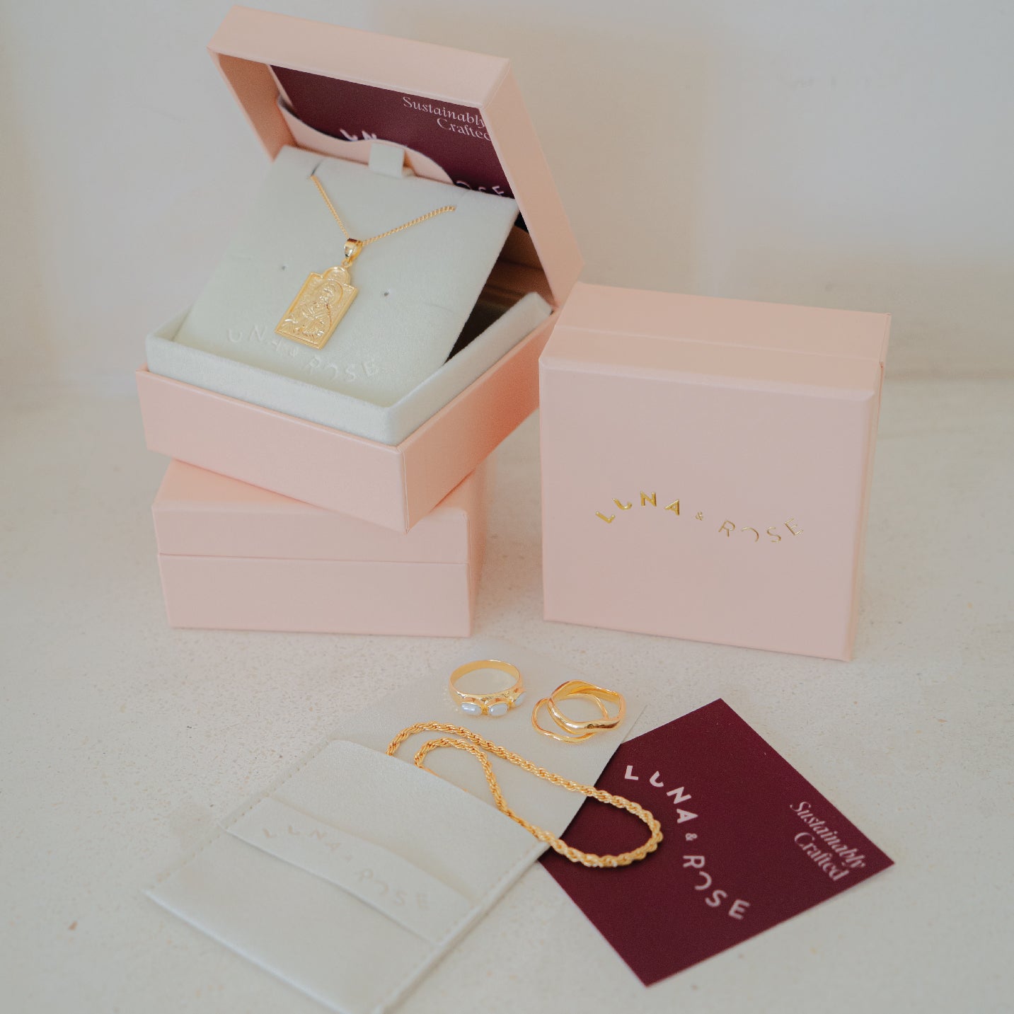 Elegant packaging for handcrafted solid gold jewelry, designed for a luxurious unboxing experience.