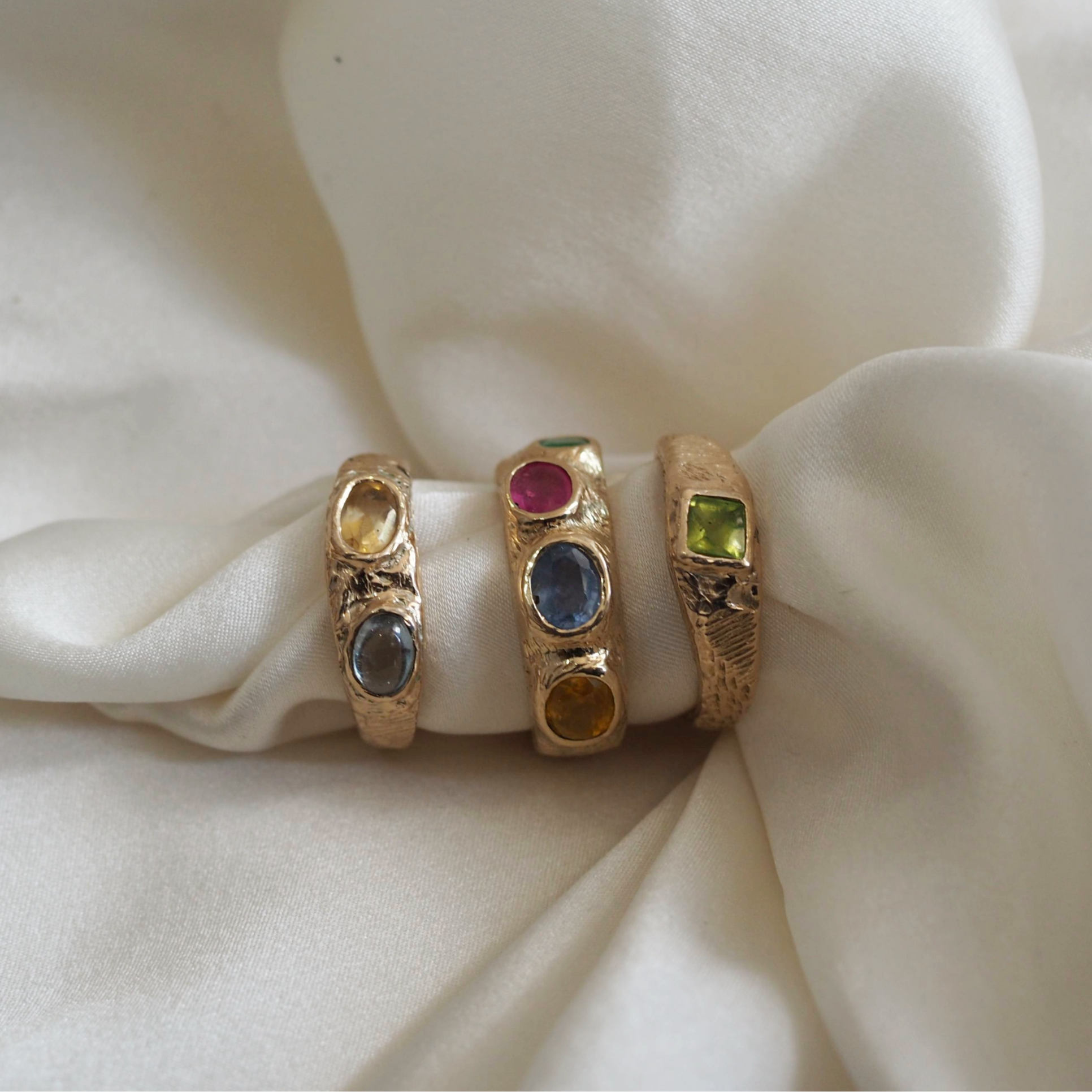 Solid gold Ziggy ring with four customizable stones, elegant and made to order.