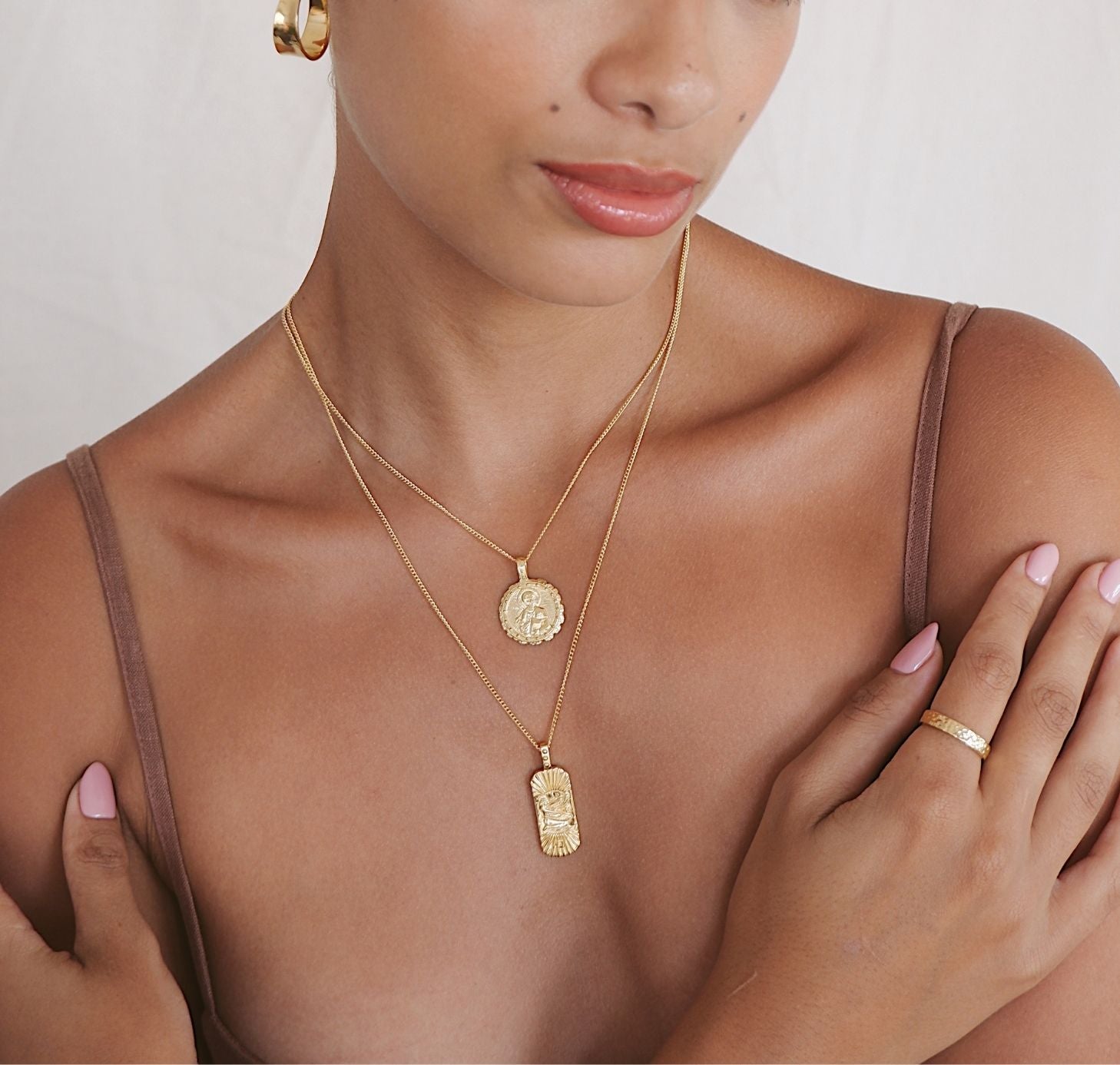 two layers necklace gold on her