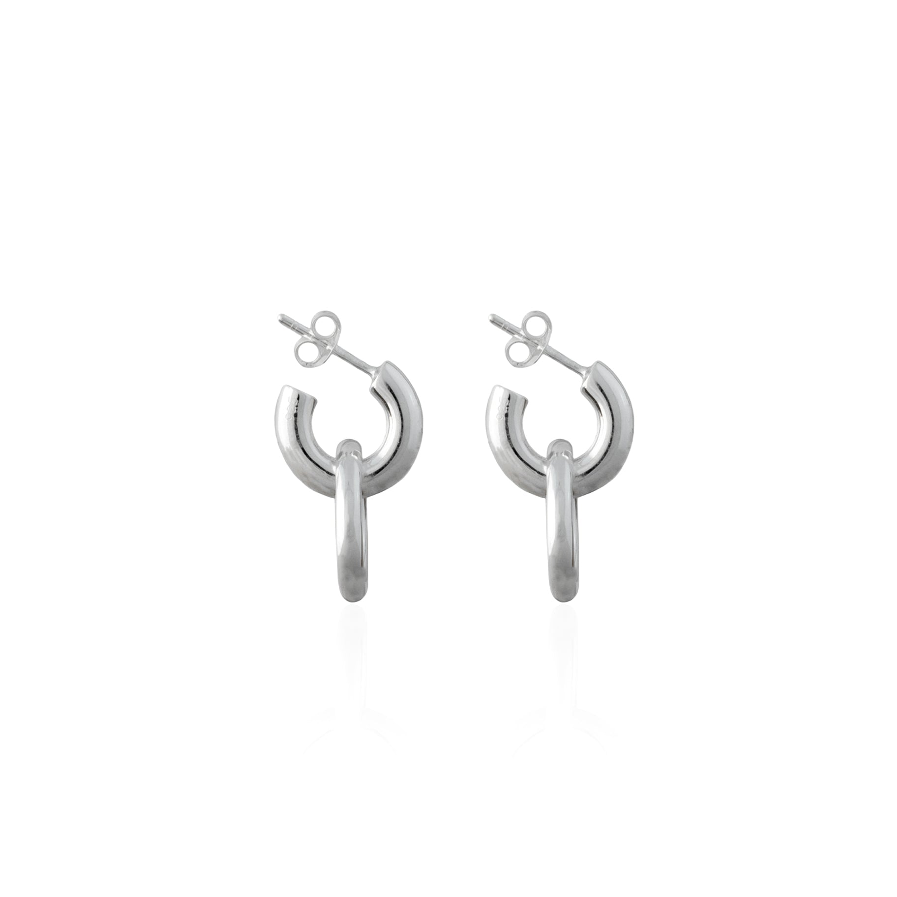 A pair of silver earrings featuring a double hoop design on a plain white background.