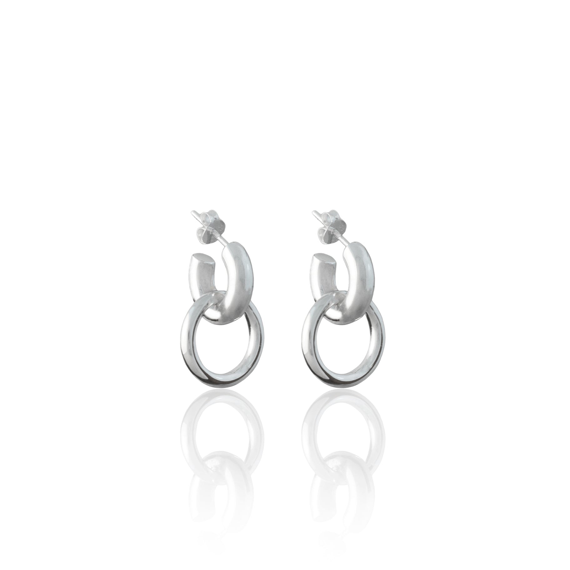 A pair of silver earrings featuring a double hoop design on a plain white background.
