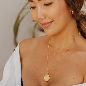 Triple heart necklace in Gold