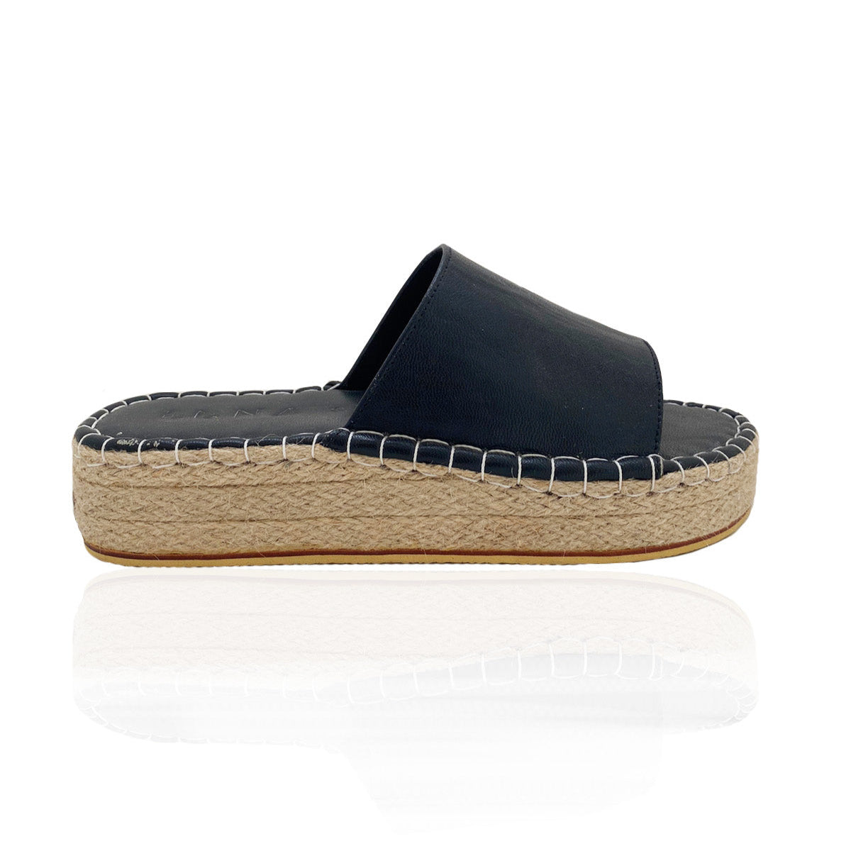 A side profile of a black slider sandal with a woven sole on a white background.