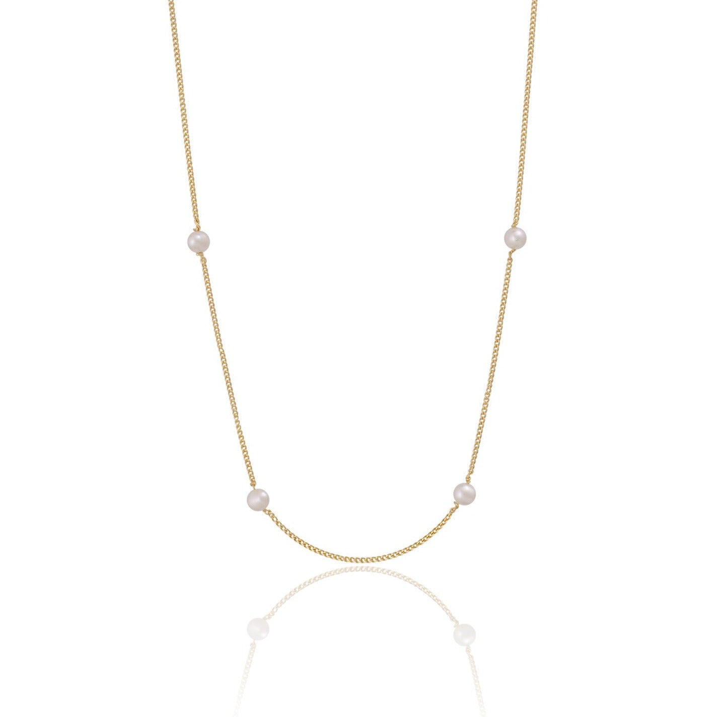 The Maisy Chain necklace gold with some pieces pearl white on it