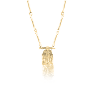 Golden necklace with pendant of libra zodiac sign