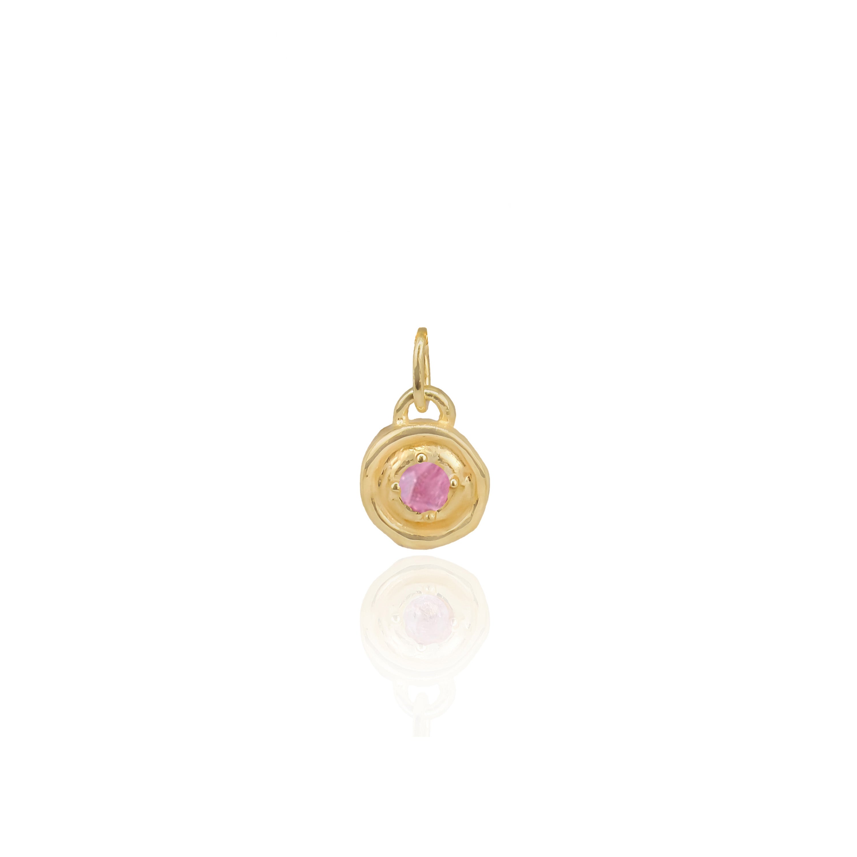 Gold pendant with a pink gemstone on a white background