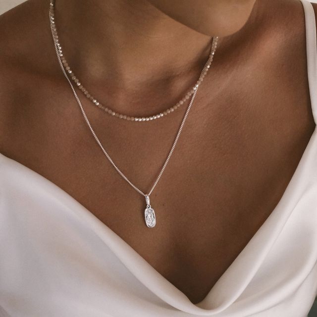Boho-inspired layered silver necklaces 