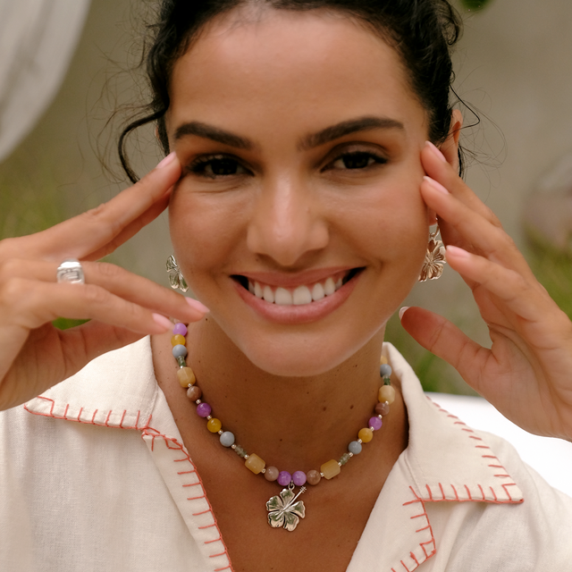 Casual chic style: white shirt styled with silver jewelry