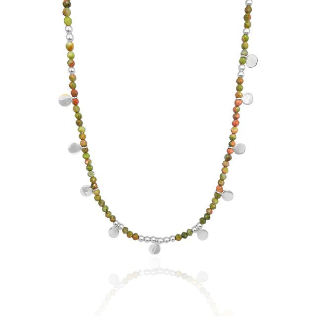 Sienna Sol Necklace - Silver face design in white reflection 