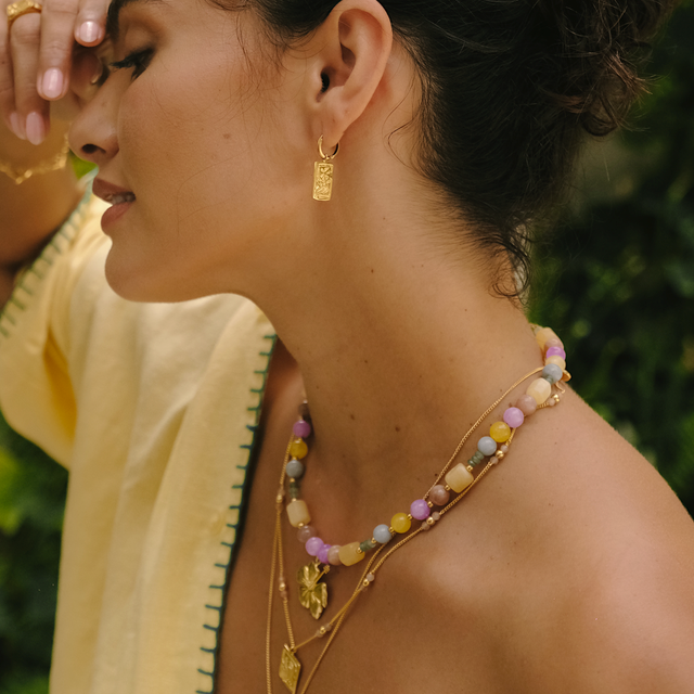 Sophisticated outfit featuring a yellow dress and gold jewelry by luna rose