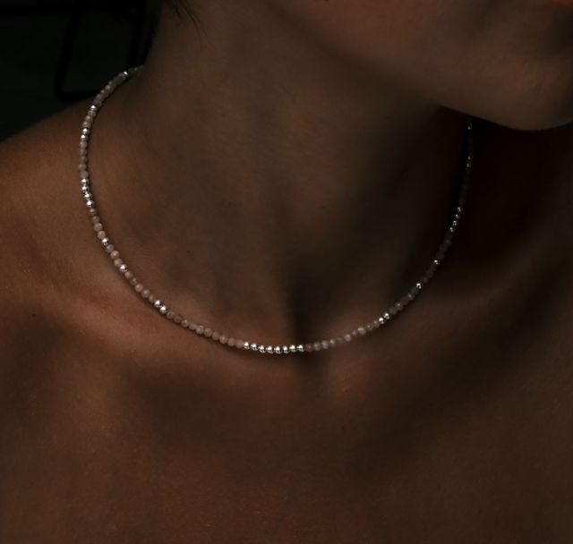 a woman wearing The Billy Blush Necklace Silver by Luna and Rose Bali 
