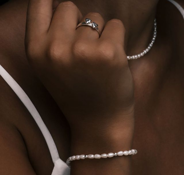 a woman wearing The Remi Bracelet Silver by Luna and Rose Bali 