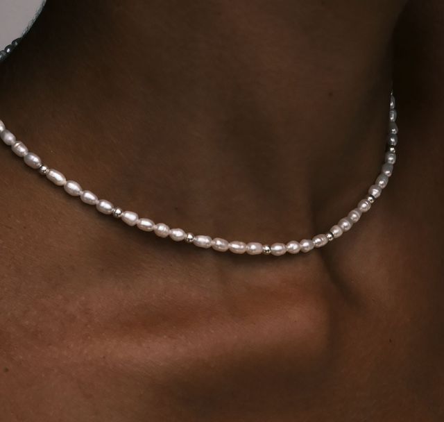 a woman wearing The Remi Necklace Silver by Luna and Rose Bali 