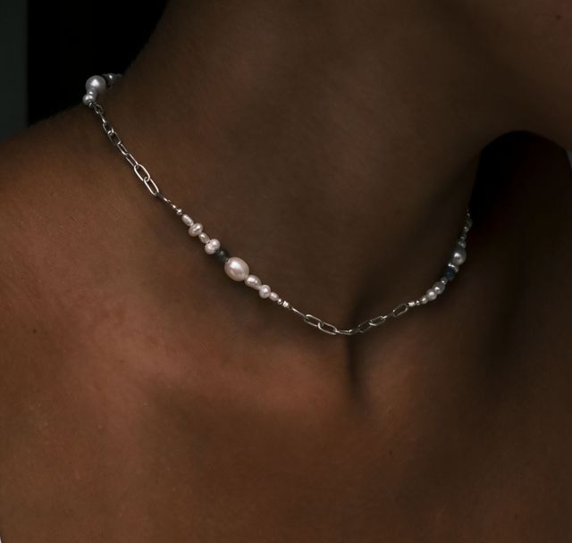 a woman wearing The Shoreline Necklace Silver by Luna and Rose Bali
