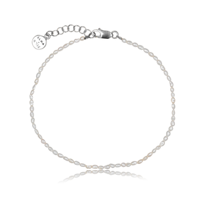 The Timeless pearl silver anklet on white background