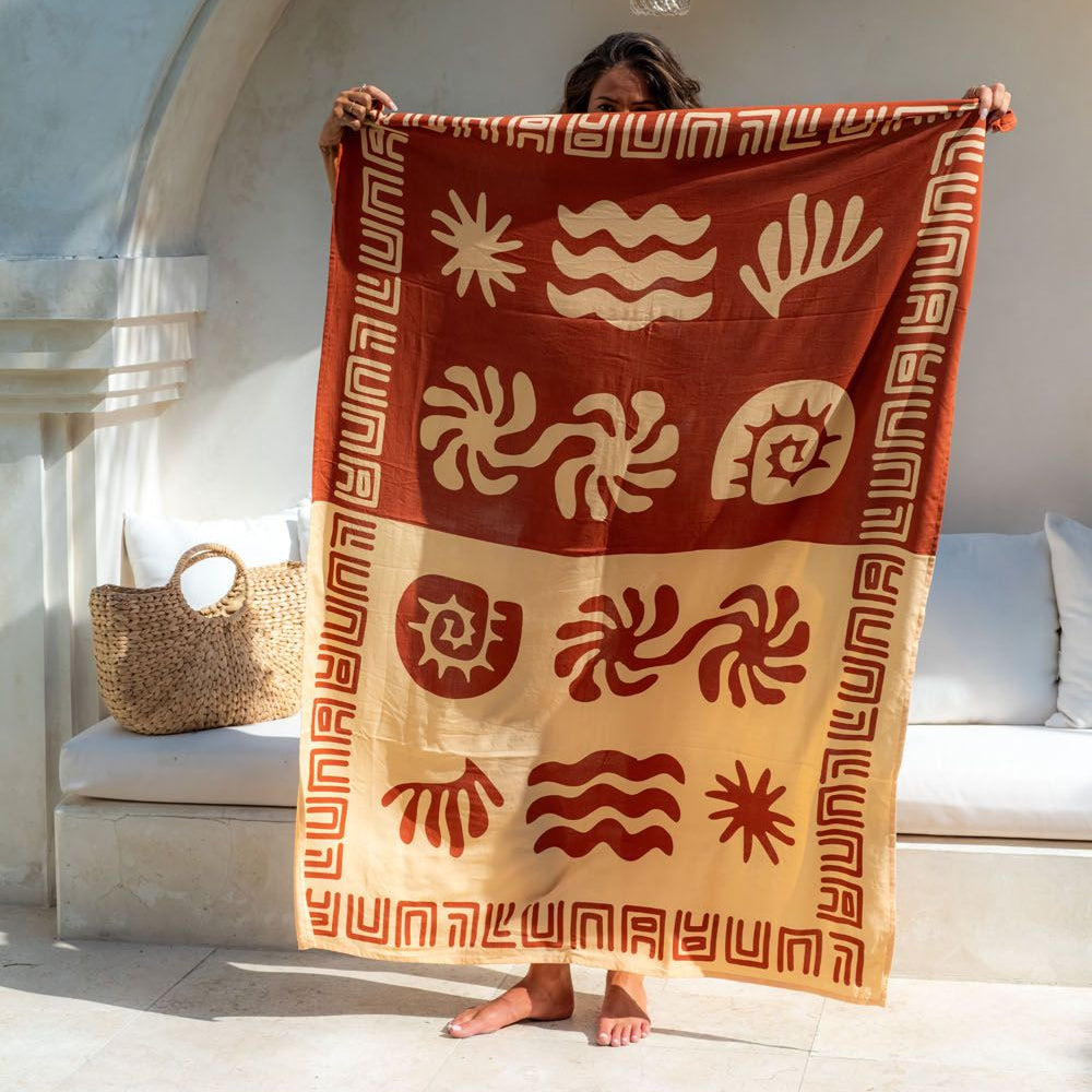 Beautiful terracotta sarong styled for a beach day